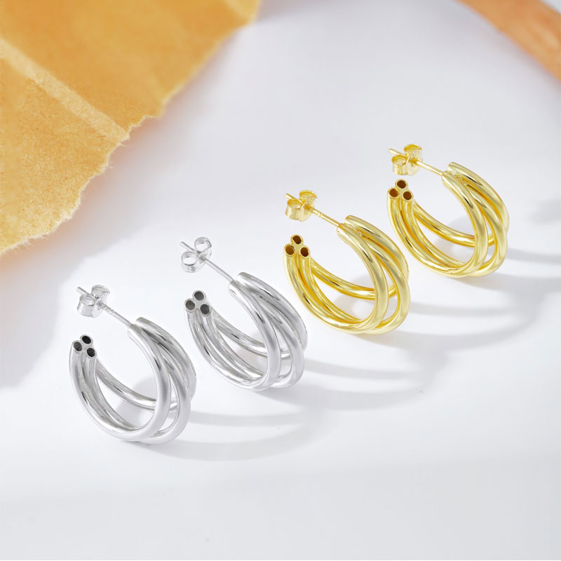 triple hoop gold earrings