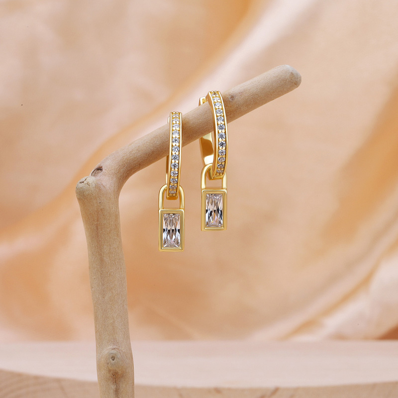 gold hoop earrings with charm